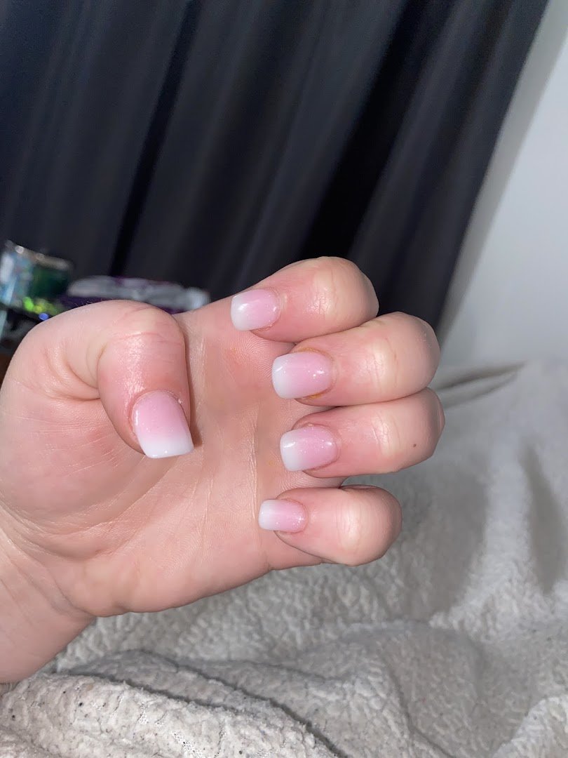 Close view of polished nails and tools